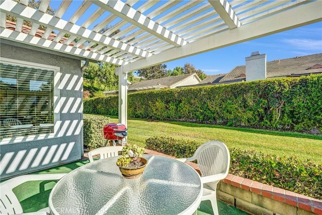 view of patio / terrace featuring fence, outdoor dining area, and a pergola