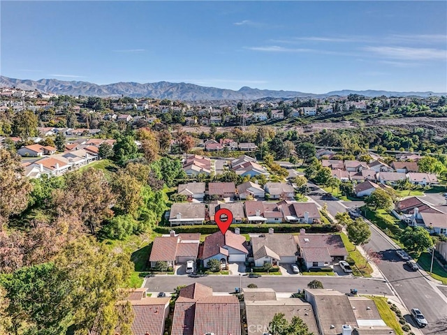 aerial view with a residential view and a mountain view