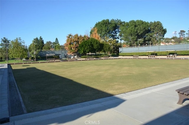 view of property's community with fence