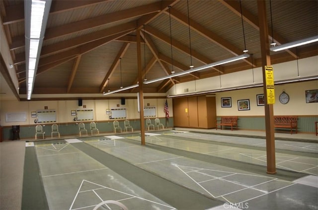 view of property's community featuring shuffleboard