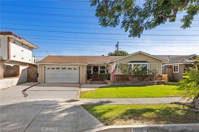 view of front facade with a front yard and a garage