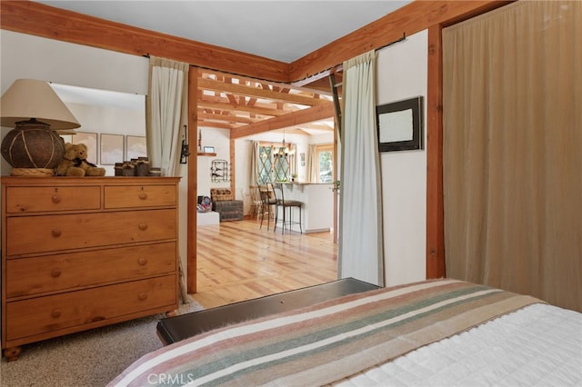 bedroom featuring a chandelier