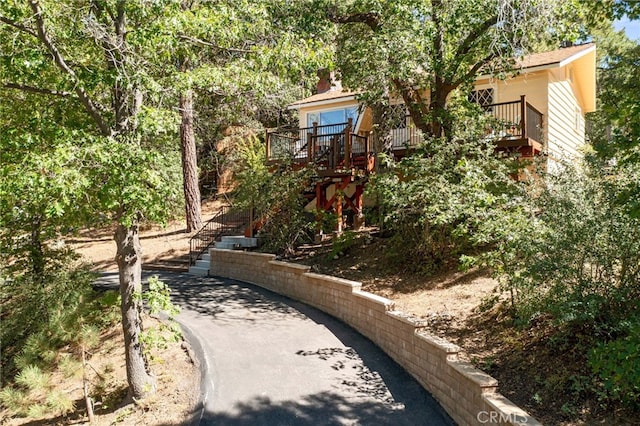 view of yard featuring a wooden deck