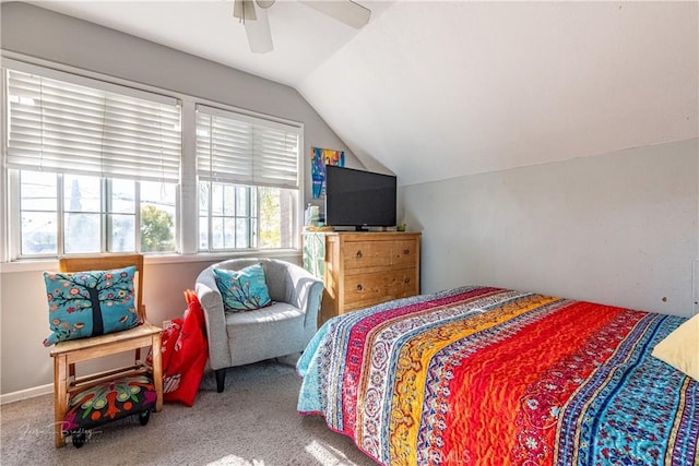 carpeted bedroom featuring ceiling fan and lofted ceiling