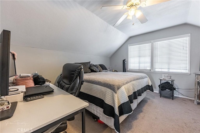 carpeted bedroom with ceiling fan and lofted ceiling