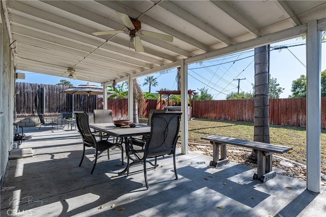 view of patio featuring ceiling fan