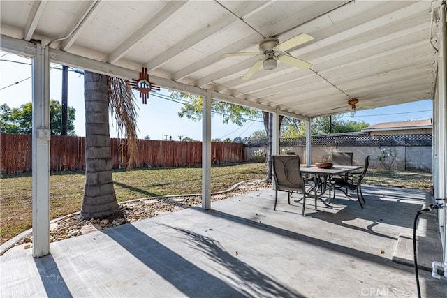 view of patio featuring ceiling fan