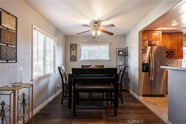 dining space with ceiling fan