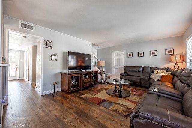 living room featuring dark hardwood / wood-style floors