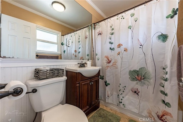 full bathroom featuring toilet, vanity, ornamental molding, and shower / bathtub combination with curtain