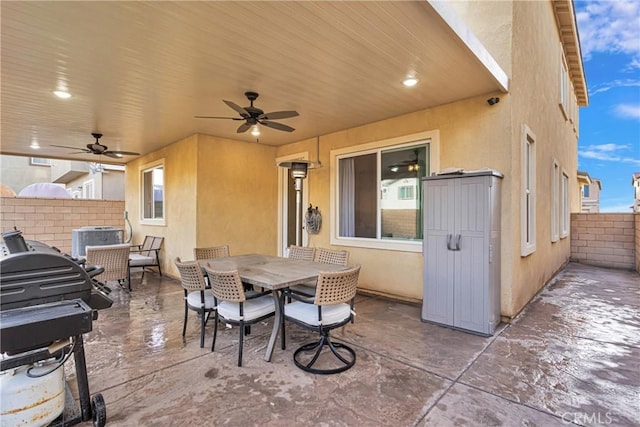 view of patio featuring ceiling fan, central AC unit, and area for grilling