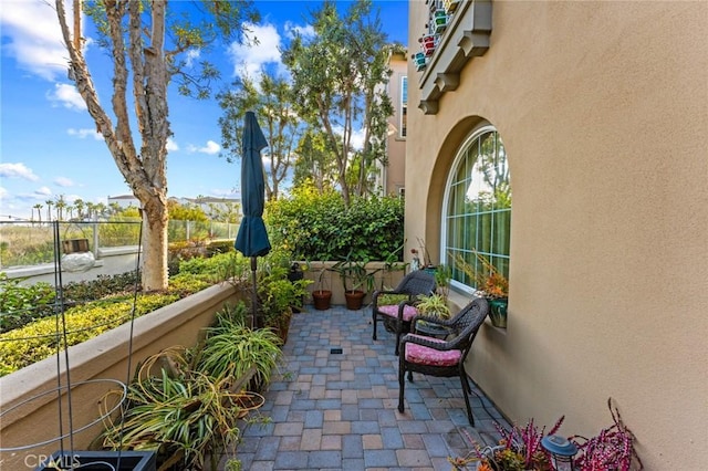 view of patio with fence