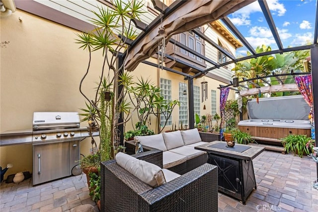 view of patio / terrace with a pergola, a grill, a hot tub, area for grilling, and an outdoor hangout area