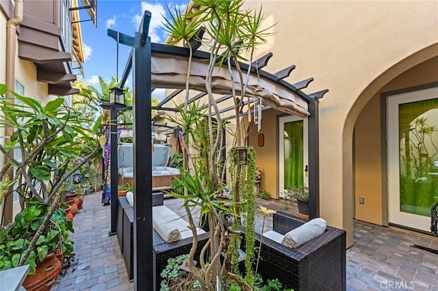 view of patio featuring a pergola