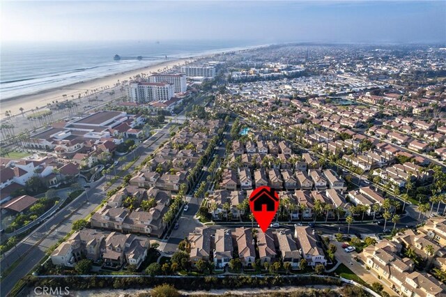 aerial view with a beach view and a water view