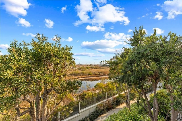 water view featuring fence