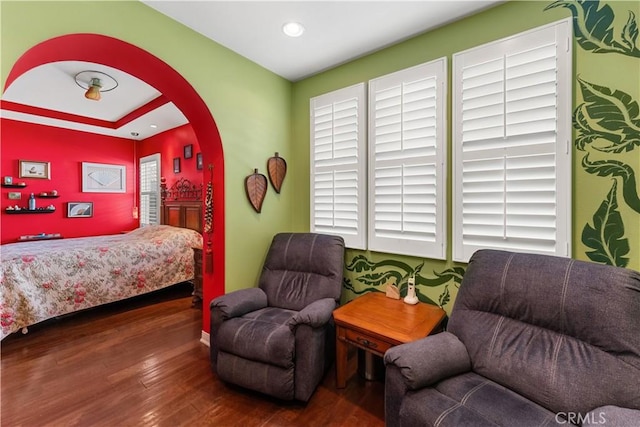 bedroom featuring dark hardwood / wood-style flooring