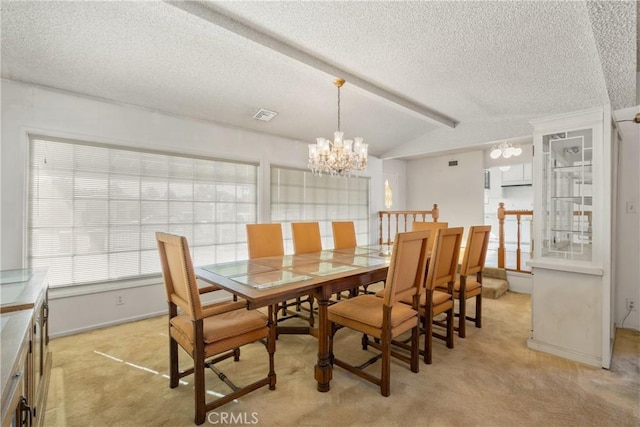 carpeted dining area featuring a textured ceiling, a chandelier, and vaulted ceiling with beams