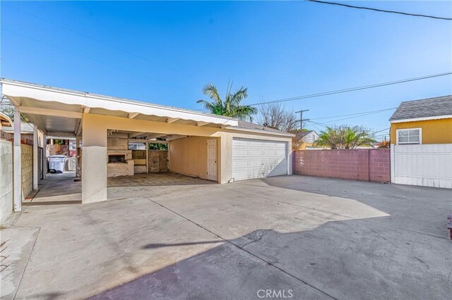 garage with a carport