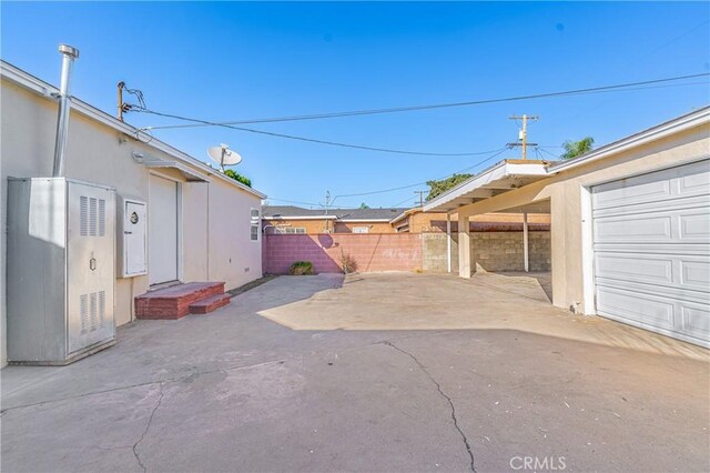 view of patio with a garage