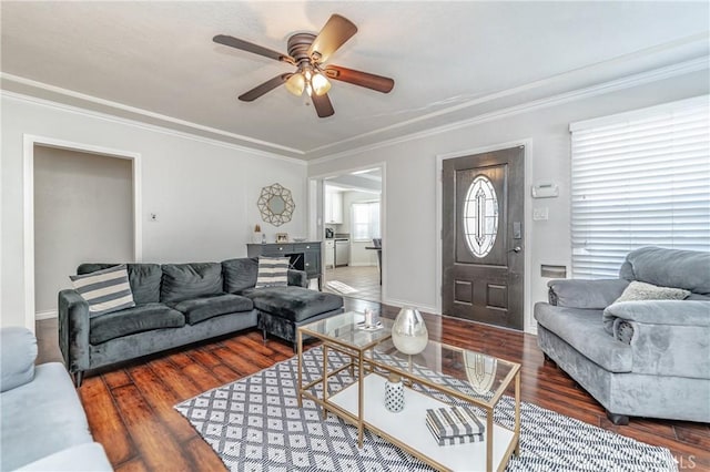 living room featuring ceiling fan, crown molding, and hardwood / wood-style floors