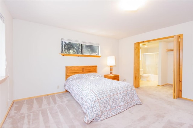 2206 Bernina Dr, Pine Mountain Club, CA 93222 - bedroom with carpet flooring, baseboards, and ensuite bath