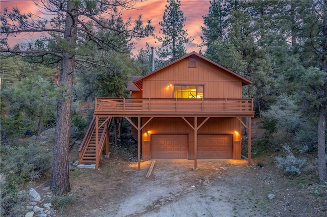 2206 Bernina Dr, Pine Mountain Club, CA 93222 - chalet / cabin featuring a deck, driveway, stairway, and a view of trees