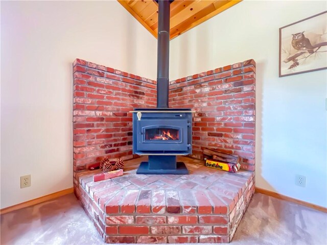 2206 Bernina Dr, Pine Mountain Club, CA 93222 - detailed view of carpet, a wood stove, and baseboards