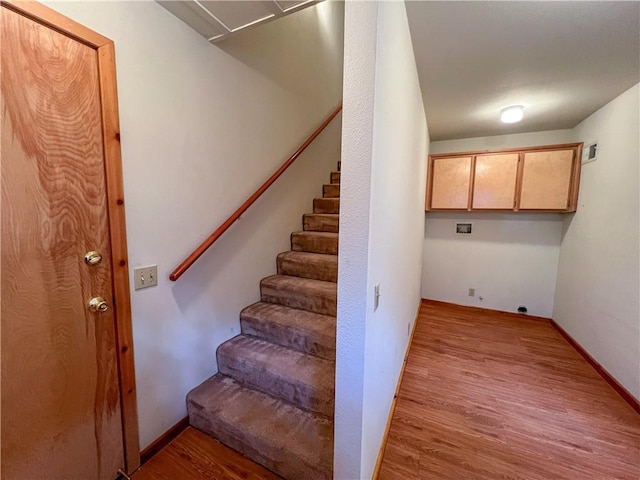 2206 Bernina Dr, Pine Mountain Club, CA 93222 - stairway featuring wood finished floors and baseboards