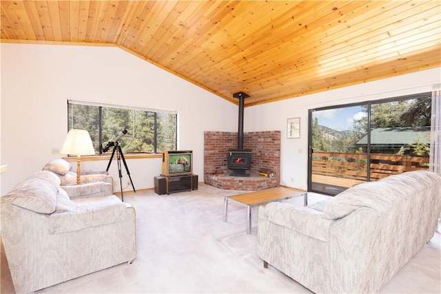 2206 Bernina Dr, Pine Mountain Club, CA 93222 - carpeted living room with wood ceiling, plenty of natural light, lofted ceiling, and a wood stove