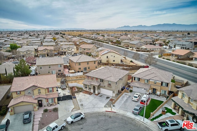 drone / aerial view featuring a mountain view