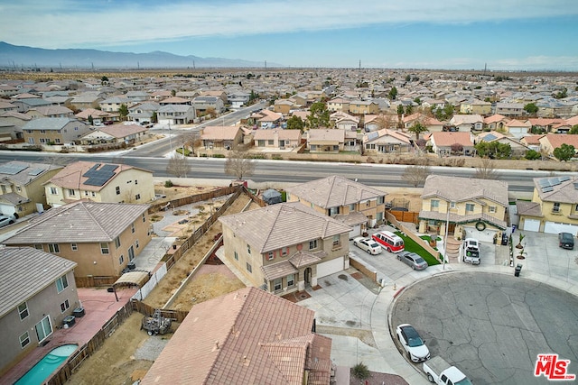 drone / aerial view featuring a mountain view