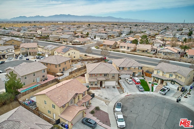 bird's eye view with a mountain view