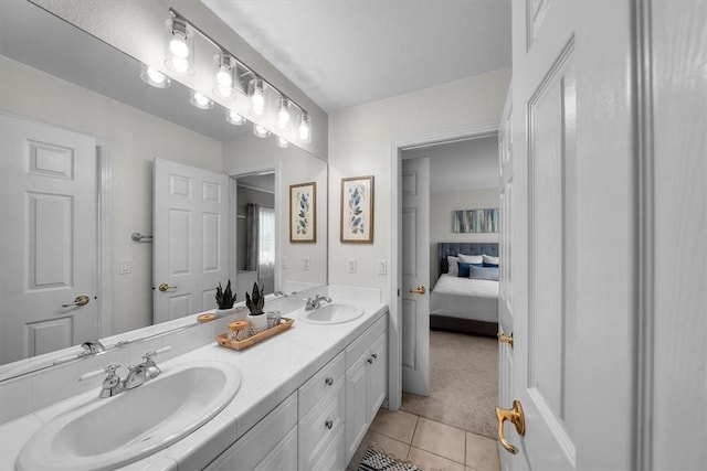 bathroom featuring tile patterned floors and vanity