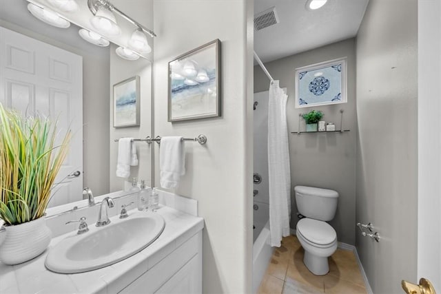 full bathroom with tile patterned floors, vanity, shower / bath combination with curtain, and toilet