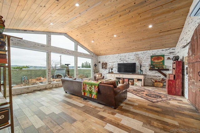 living room featuring light hardwood / wood-style floors and wooden ceiling