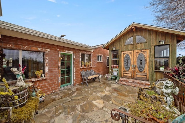 doorway to property with french doors and a patio