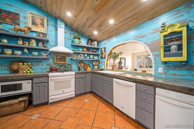 kitchen with vaulted ceiling, extractor fan, gray cabinets, white appliances, and wooden ceiling