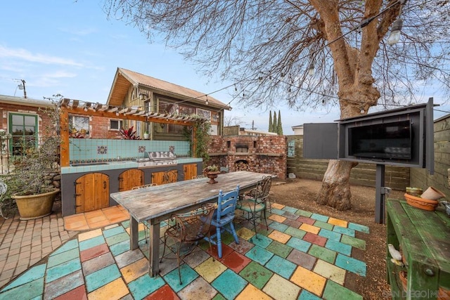 view of patio / terrace featuring a fireplace