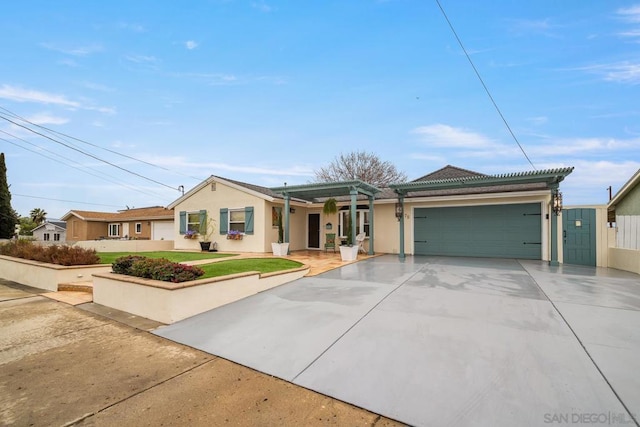 ranch-style home with a pergola and a garage