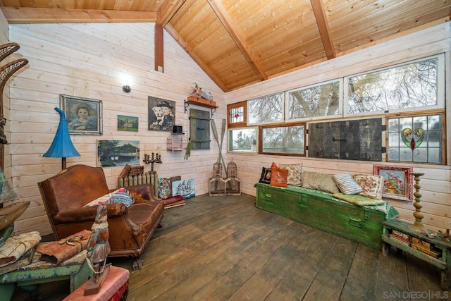 interior space featuring wooden ceiling, vaulted ceiling with beams, wood-type flooring, and wooden walls