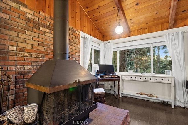 interior space with brick wall, lofted ceiling, wood ceiling, dark hardwood / wood-style flooring, and a wood stove