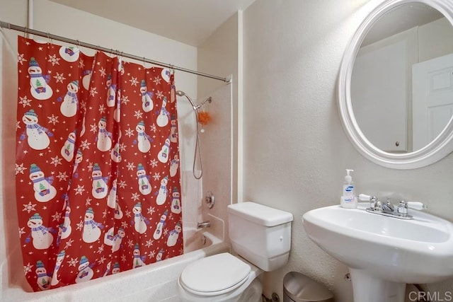 full bathroom with sink, toilet, and shower / bath combo