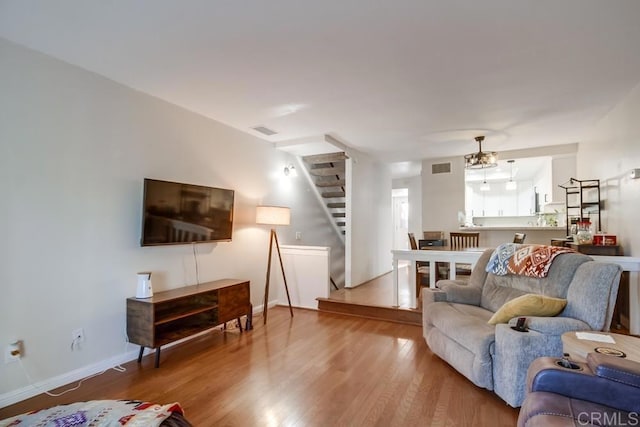 living room with hardwood / wood-style flooring