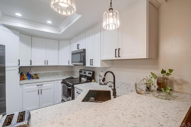 kitchen with sink, crown molding, white cabinetry, light stone countertops, and appliances with stainless steel finishes