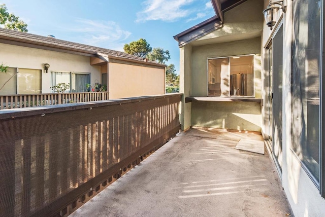 view of property exterior with a balcony