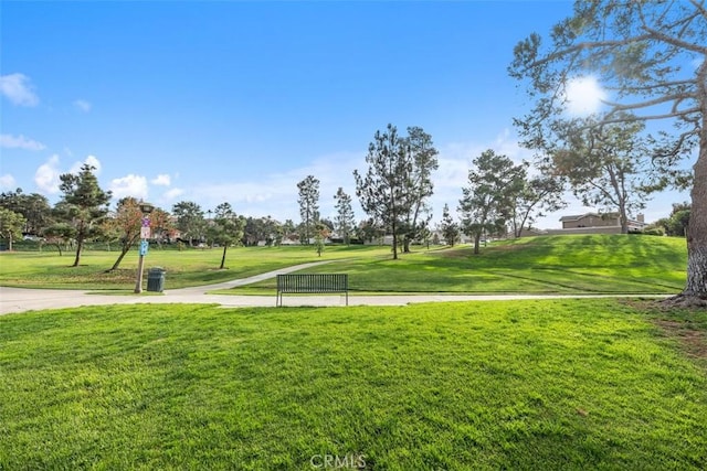 view of home's community featuring a yard