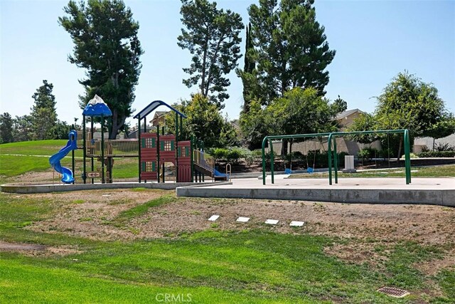 view of jungle gym featuring a yard