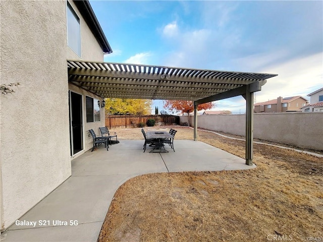 view of patio featuring a pergola