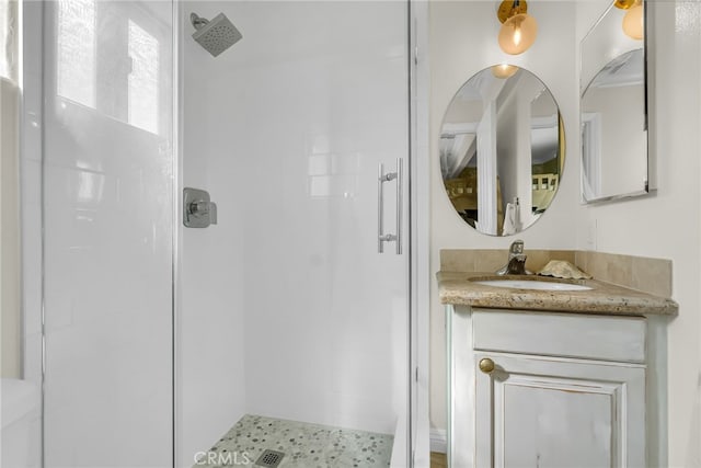 bathroom featuring vanity and walk in shower